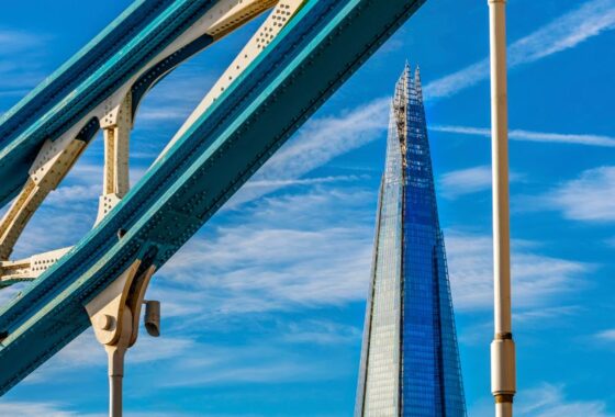 A skyscraper with a clear blue sky