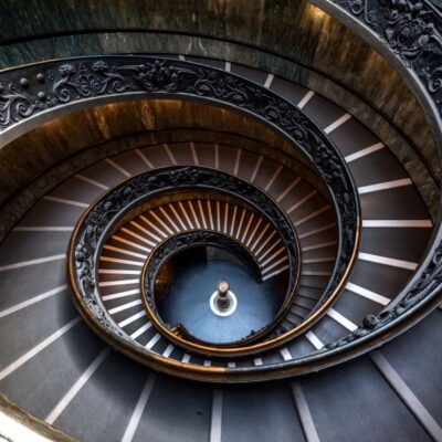 An image of a spiral staircase in a building.