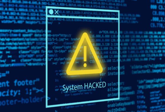 System hacked sign on a computer screen.